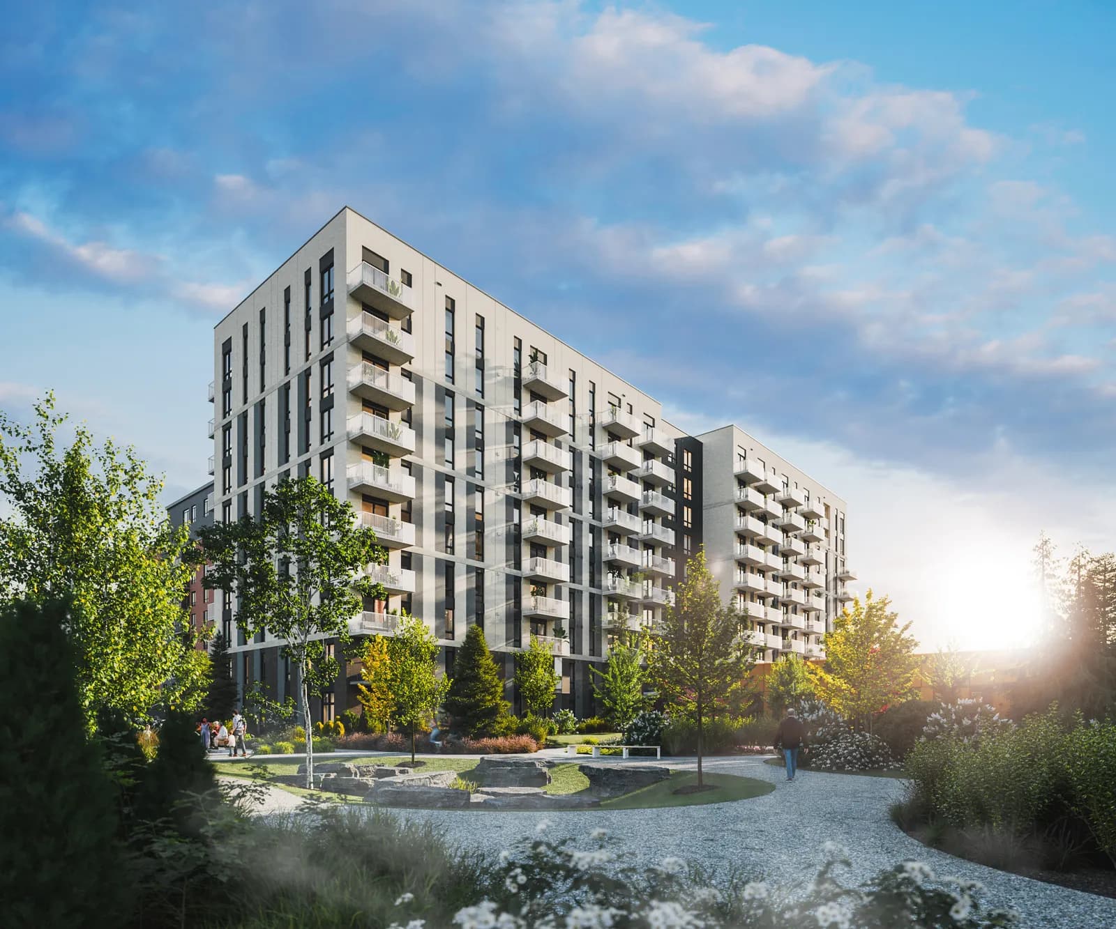 Vue extérieure de la tour Hémisphère et de ses jardins aménagés à Pointe-Claire